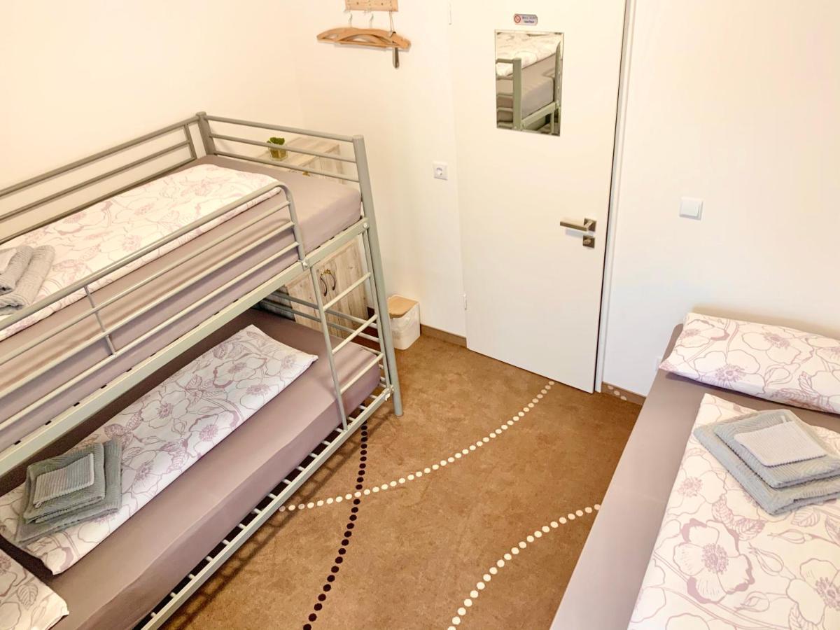 Single Bed 3-Bed Dormitory Room